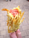 hotdog-on-a-stick-covered-in-french-fries