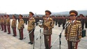 asian army wearing a gold armor